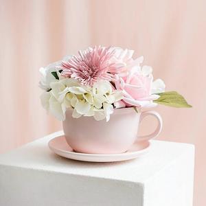 A NEW addition to our coffee cup pot range just in time for Mother’s Day. 

These NEW Ceramic Coffee Cup Pot & Plate in Matte Pink is a stylish option for floral arrangements. 

Crafted with care, each piece features a sophisticated matte finish that adds a touch of elegance to your decor.

The cup has a diameter of 15cm with a slight lip at the edge of the rim. It stands at a height of 10cm, and is sold individually. The attached plate measures 18cm in diameter. 

This product features a drainage hole and is also available in Matte Nude & Matte White. 

ITEM: 4611208MPK