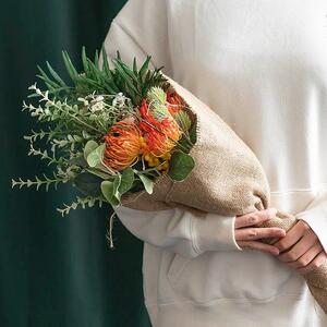 Expertly arranged and wrapped in rustic brown jute, this arrangement exudes natural charm and timeless elegance, making it a perfect gift to brighten someone’s day or add a touch of sophistication to any space.

Our Australian Mixed Native Flower Bouquet in Orange features a harmonious blend of babies breath, eucalyptus leaves,and wattle.

This product is sold individually and measures 50cm tall.

ITEM: 470054OR
.
.
#kochandco #kochinspo #artificialflowerarrangement 

This product is sold individually and measures 50cm tall.
