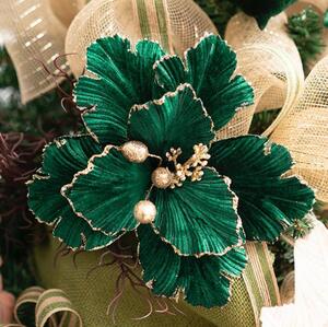 Add a touch of festive elegance to your holiday decor with our Christmas Poinsettia Flower Clip in a rich Dark Green. The flower head is accented with champagne glitter on the outer edges and inner parts of the petals 🌲

This clip can be easily attached to Christmas tree branches, wreaths, garlands, or any seasonal arrangement, bringing a luxurious and sparkling touch to your celebrations.

The flower head measures 24cm in diameter and stands 10cm tall. 
It is available in packs of three.

SKU: 33001070DGR

.
.
#kochandco #kochinspo #greenpoinsettia #christmaspoinsettia #christmasflowers #christmastreedecor