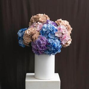 Our Eldorado Hydrangea Stems are  a premium artificial hydrangea. Each delicate petal is fashioned from 3D-printed fabric for superior detailing. With a mesmerising gradation effect lending a touch of realism, every bloom captivates with its natural beauty. 

Standing tall at 64cm, each intricately crafted flower head spans 6.5cm in diameter, with the total diameter being 18cm. 

Available in soft purple, soft pink, soft brown and blue.

This flower is sold individually.

SKU: 478185VI, BP, NU, BL

.
.
#kochandco #kochinspo #artificialflowers #hydrangeas #artificialfloralarrangement
