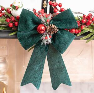 This large pre-made velvety style bow in dark green with Christmas berry and pine cone cluster is an easy way to achieve a perfect bow for wreaths, garlands, Christmas tree decor, table displays and more 💚

The front of the bow is velvety soft and has a PVC backing, enabling it to always hold its shape. Featuring easy-to-use twist tie attachments, this bow is a surefire way to add a polished yet fun touch to your gifts and decor this holiday season.

The overall width is 24cm and the overall length, from top loop to tail end is 30cm. 

Sold as an individual bow.

SKU: 2119063GR

.
.
#kochandco #kochinspo #velvetbow #christmasbow #christmastreedecorations #greenchristmasdecor