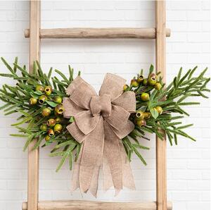 This pre-made dark natural linen bow provides an easy way to decorate gifts, wreaths, Christmas tree decor, and more with a perfect bow, every time. 

This rustic bow has a sewn wired edge, which gives it a polished finish. Featuring easy-to-use tie attachments, this bow provides a simple way to add a homey festive touch to your gifts and decor this holiday season.

This bow has 6 loops at the top and 2 tails and measures 20cm at the widest point and its overall length, from top loop to tail end, is 26cm. 

This product is available as a single bow.

SKU: 2119090BR

.
.
#kochandco #kochinspo #christmasbow #linenbows #christmasdecorations #premadebows